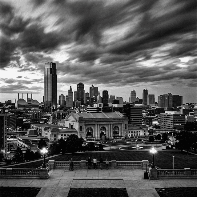 Kansas City skyline at dusk from Liberty Memorial, Union Station in foreground