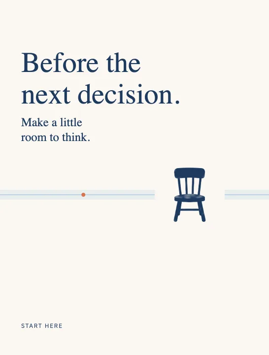 Before the next decision. Make a little room to think. A navy chair on a thin blue path.
